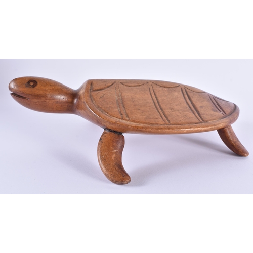 96 - AN UNUSUAL PITCAIRN ISLANDS TORTOISE by Christy Warren. 25 cm wide.