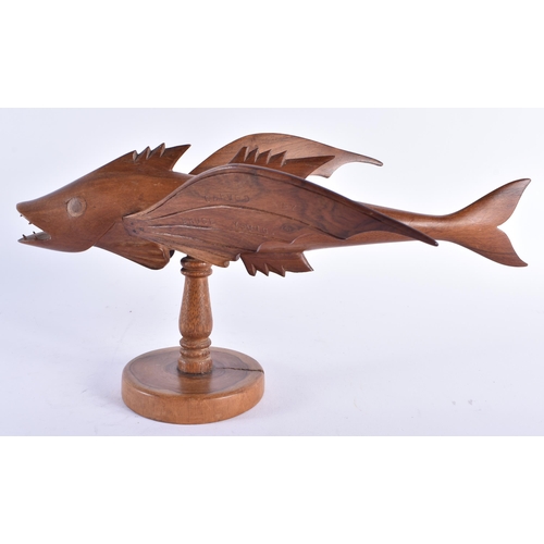 97 - A PITCAIRN ISLANDS FLYING FISH by Bruce Young. 33 cm wide.