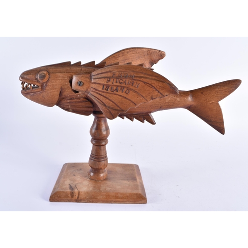 98 - A PITCAIRN ISLANDS FLYING FISH by Fred Christian. 33 cm wide.