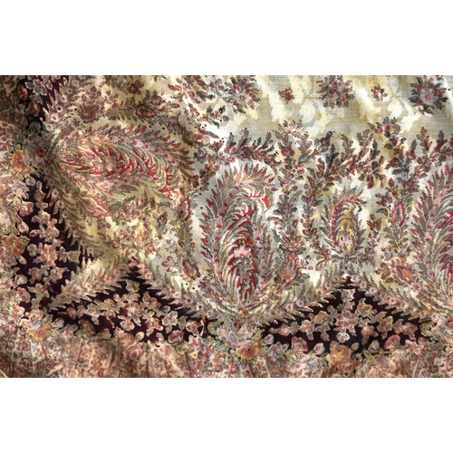 99 - A VINTAGE EMBROIDERED SHAWL OR TABLE COVER decorated with finely worked flowers. 170 cm x 140 cm app... 