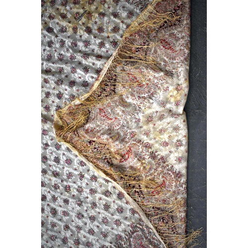 99 - A VINTAGE EMBROIDERED SHAWL OR TABLE COVER decorated with finely worked flowers. 170 cm x 140 cm app... 