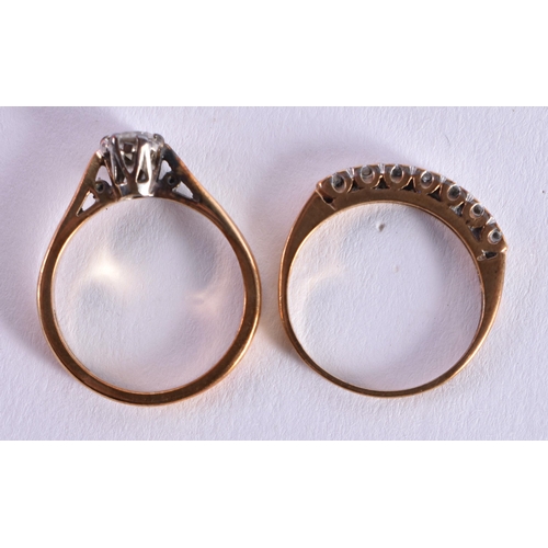 1076 - TWO 9CT GOLD RINGS. 4.2 grams. M. (2)