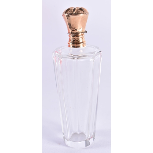 1084 - AN 18CT GOLD MOUNTED SCENT BOTTLE. 44.7 grams overall. 9 cm x 3 cm.