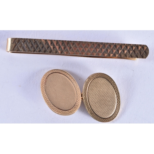 1088 - A 9CT GOLD CUFFLINK and 9ct gold clip. 10.7 grams. (2)