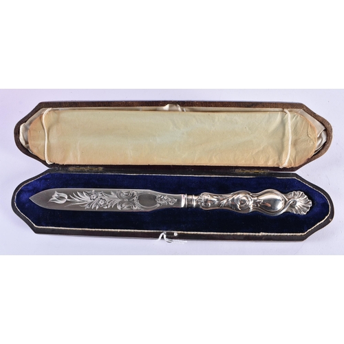 1090 - A CASED VICTORIAN SILVER LETTER OPENER. Sheffield 1878. 50 grams. 23.5 cm long.