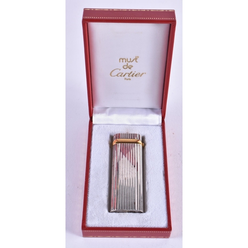 1091 - A BOXED CARTIER LIGHTER. 7 cm x 2.5 cm.