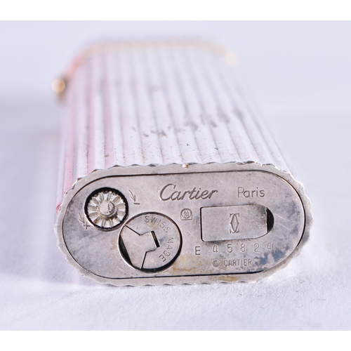 1091 - A BOXED CARTIER LIGHTER. 7 cm x 2.5 cm.