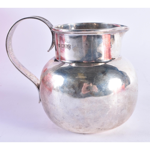 1101 - A SILVER JUG. London 1912. 256.2 grams. 13 cm x 11.25 cm.