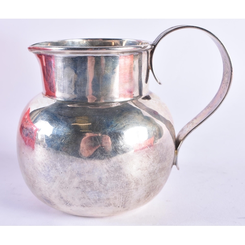 1101 - A SILVER JUG. London 1912. 256.2 grams. 13 cm x 11.25 cm.