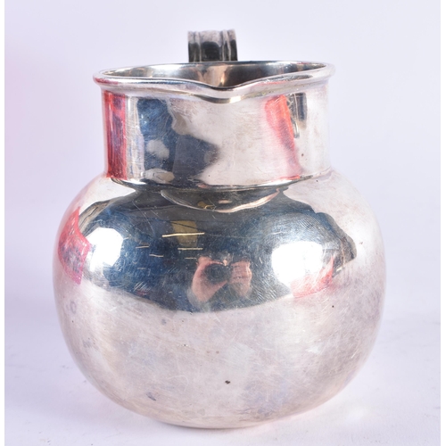 1101 - A SILVER JUG. London 1912. 256.2 grams. 13 cm x 11.25 cm.