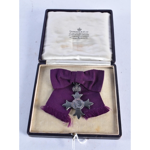 1371 - AN MBE MEDAL. 29 grams. 9.5 cm x 9 cm.