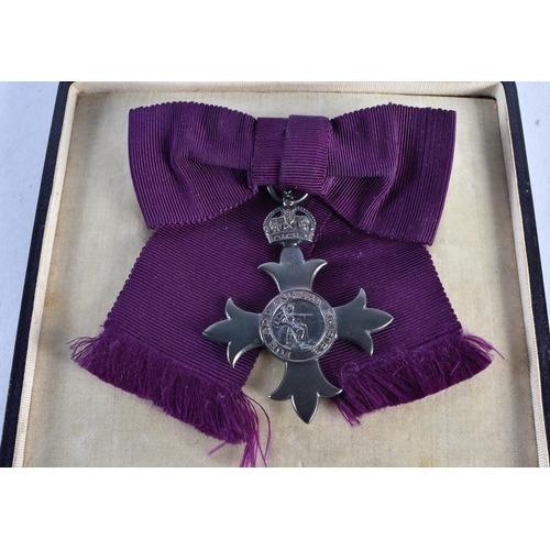 1371 - AN MBE MEDAL. 29 grams. 9.5 cm x 9 cm.