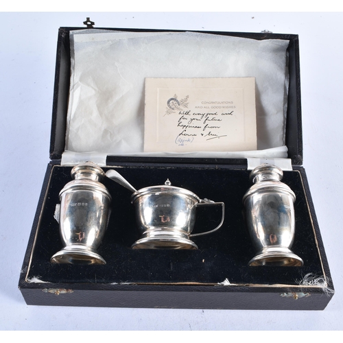 1375 - AN ART DECO SILVER CRUET. London 1938. Silver 83 grams. Largest 8.25 cm x 4 cm. (3)