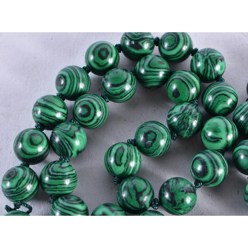 1376 - A MALACHITE NECKLACE. 97 grams. 95 cm long.