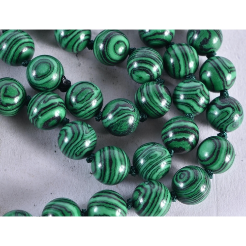 1376 - A MALACHITE NECKLACE. 97 grams. 95 cm long.