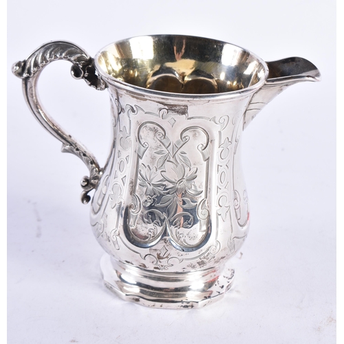 1377 - A VICTORIAN SILVER ENGRAVED JUG. 188 grams.