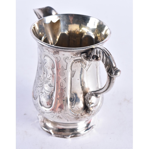 1377 - A VICTORIAN SILVER ENGRAVED JUG. 188 grams.