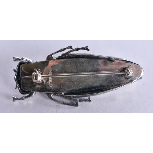 1654 - A SILVER LOCUST BROOCH. 15 grams. 4.5 cm x 2 cm.