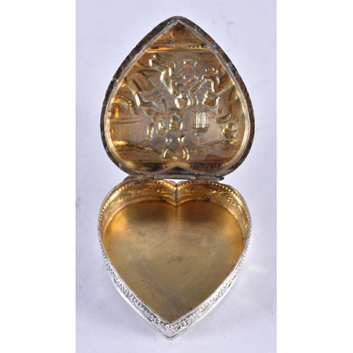 1658 - AN ANTIQUE HEART FORM SILVER BOX. 35.2 grams. 5 cm x 5 cm.