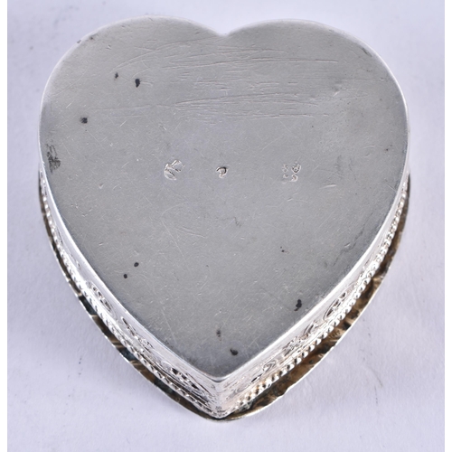 1658 - AN ANTIQUE HEART FORM SILVER BOX. 35.2 grams. 5 cm x 5 cm.