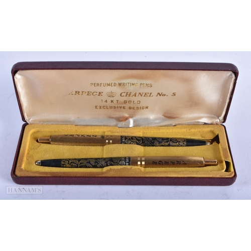 1795 - A PAIR OF CHANEL PENS. 16.9 grams. 13 cm x 1 cm.