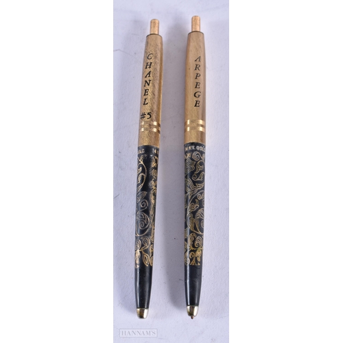 1795 - A PAIR OF CHANEL PENS. 16.9 grams. 13 cm x 1 cm.