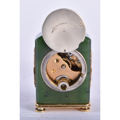 1809 - A CONTINENTAL 14CT GOLD DIAMOND AND JADE TRAVELLING CLOCK. 83 grams. 4.5 cm x 3 cm.