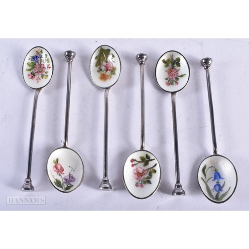 1815 - A CASED SET OF SILVER AND ENAMEL SPOONS. 60 grams. 10 cm long. (6)