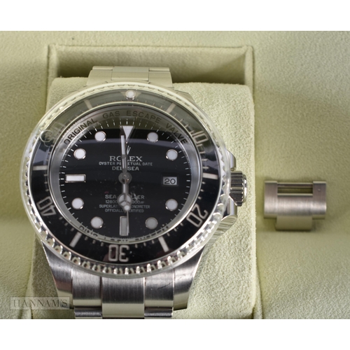 1821 - A ROLEX STAINLESS STEEL SEA DWELLER WRISTWATCH. 4.75 cm wide inc crown.