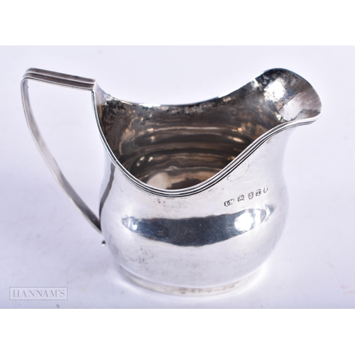 1935 - A Georgian Silver Cream Jug by John Merry Hallmarked London 1814.  10.8cm x 8.3cm x 6.8cm, weight 78... 