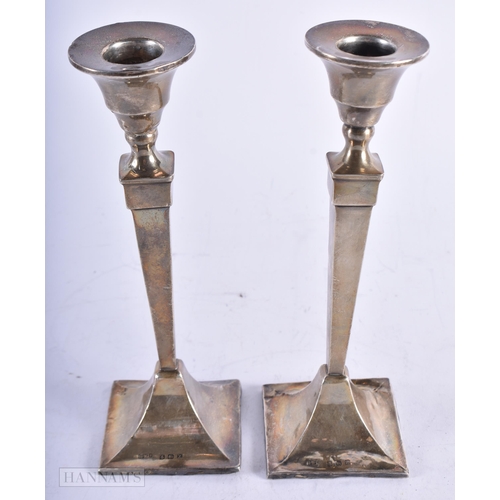 1971 - A PAIR OF ART DECO SILVER CANDLESTICKS. Birmingham 1924. 344 grams overall. 18.5 cm high.