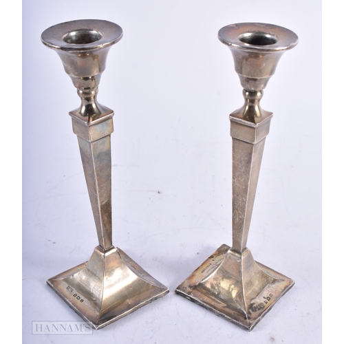 1971 - A PAIR OF ART DECO SILVER CANDLESTICKS. Birmingham 1924. 344 grams overall. 18.5 cm high.