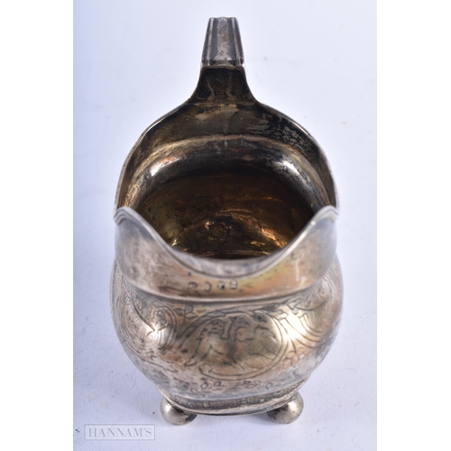 1976 - AN ANTIQUE SILVER CREAM JUG. London 1810. 140 grams. 12.75 cm x 10.25 cm.