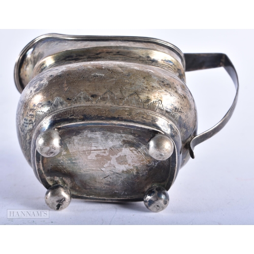 1976 - AN ANTIQUE SILVER CREAM JUG. London 1810. 140 grams. 12.75 cm x 10.25 cm.