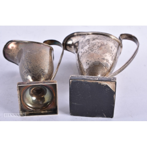 1993 - TWO ANTIQUE SILVER JUGS. 213 grams. Largest 14 cm high. (2)