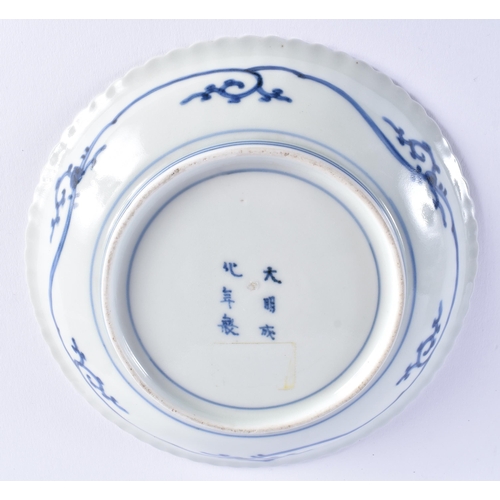 2001 - A LOVELY 18TH CENTURY JAPANESE EDO PERIOD BLUE AND WHTIE FLUTED DISH of chrsanthemum moulded form, p... 