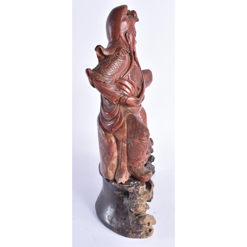 2060 - A LARGE 19TH CENTURY CHINESE CARVED SOAPSTONE FIGURE OF AN IMMORTAL Qing. 36 cm x 15 cm.