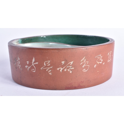 2061 - AN EARLY 20TH CENTURY CHINESE YIXING POTTERY ENAMELLED DISH decorated with calligraphy. 12 cm diamet... 