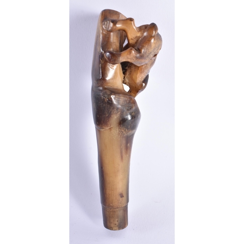 2065 - A 19TH CENTURY CHINESE CARVED BUFFALO HORN CANE HANDLE Late Qing. 103.8 grams. 15.5 cm long.