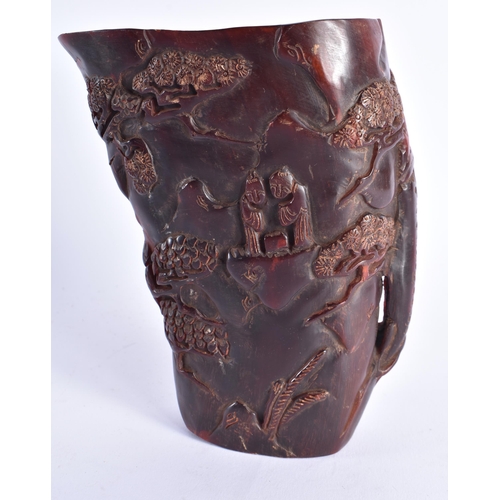 2067 - A CHINESE REPUBLICA PERIOD CARVED BUFFALO HORN LIBATION CUP decorated with figures. 548 grams. 16 cm... 