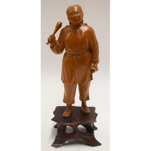 2863 - A RARE EARLY 20TH CENTURY CHINESE CARVED BOXWOOD CULTURAL REVOLUTION FIGURE. 19 cm high