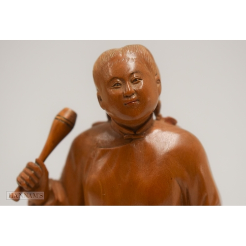 2863 - A RARE EARLY 20TH CENTURY CHINESE CARVED BOXWOOD CULTURAL REVOLUTION FIGURE. 19 cm high