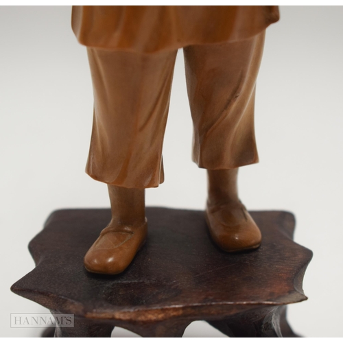 2863 - A RARE EARLY 20TH CENTURY CHINESE CARVED BOXWOOD CULTURAL REVOLUTION FIGURE. 19 cm high