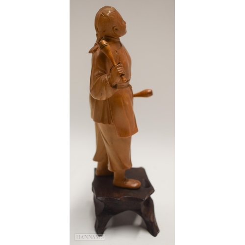 2863 - A RARE EARLY 20TH CENTURY CHINESE CARVED BOXWOOD CULTURAL REVOLUTION FIGURE. 19 cm high