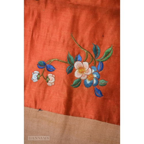 2868 - A LONG 19TH CENTURY CHINESE ORANGE RED SILK EMBROIDERED PANEL decorated with flowers. 190 cm x 57 cm