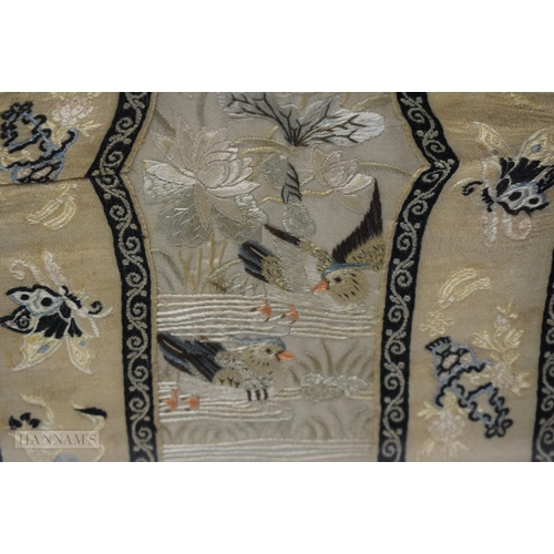 2870 - A PAIR OF 19TH CENTURY CHINESE FRAMED SILK EMBROIDERED PANELS Qing, depicting birds. 67 cm x 34 cm.