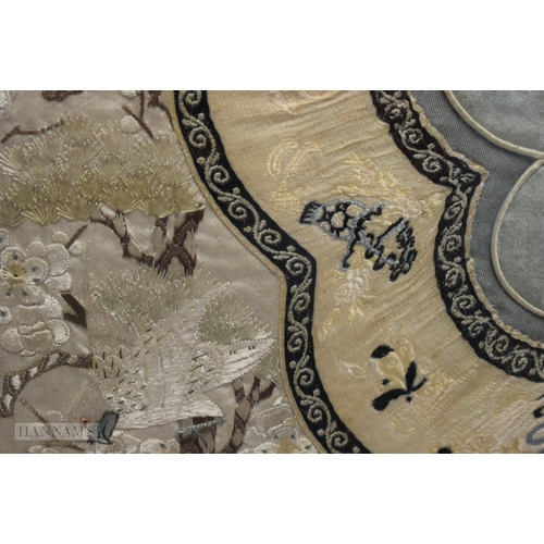 2870 - A PAIR OF 19TH CENTURY CHINESE FRAMED SILK EMBROIDERED PANELS Qing, depicting birds. 67 cm x 34 cm.