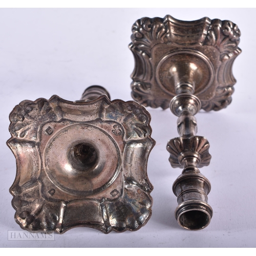 2881 - A Pair of Georgian Silver Candlestick.  Worn marks to base.  12.6cm x 7cm x 7cm, total weight 305g