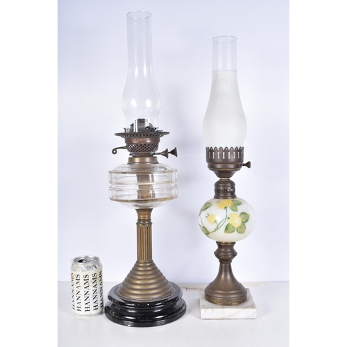 3062 - A vintage brass oil lamp together with a lamp stand in the form of an oil lamp 62cm.