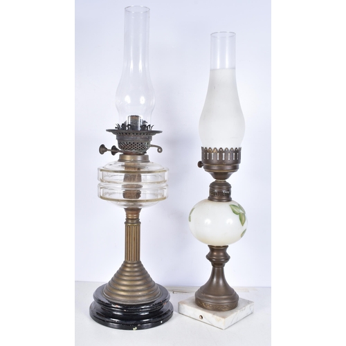 3062 - A vintage brass oil lamp together with a lamp stand in the form of an oil lamp 62cm.